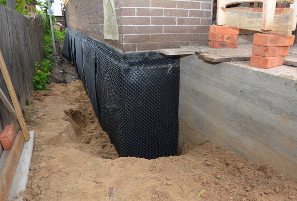 Happy homeowners after waterproofing job in Leeds